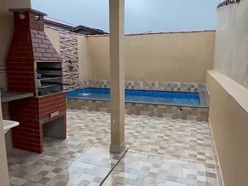 Casa com Piscina no Litoral Sul